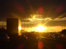 Watching the sunset through the traffic whilst driving home, it really is beautiful.